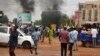 Supporters of the Nigerien defense and security forces attack the headquarters of the Nigerien Party for Democracy and Socialism (PNDS), the party of overthrown President Mohamed Bazoum, in Niamey on July 27, 2023. 