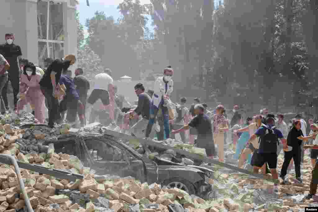 Rescuers work at Okhmatdyt children&#39;s hospital that was damaged during a Russian missile strikes in Kyiv, Ukraine, July 8, 2024.