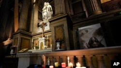 FILE - The 'Our Lady of Athletes' chapel in seen inside the Madeleine church, May 30, 2024 in Paris.