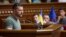 In this photo provided by the Ukrainian Presidential Press Office, Ukrainian President Volodymyr Zelenskyy addresses lawmakers during a Constitution Day session of the Ukrainian parliament in Kyiv, June 28, 2023. (Ukrainian Presidential Press Office via AP)