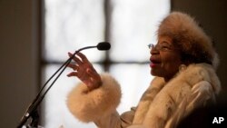 FILE - Christine King Farris, sister of the Rev. Martin Luther King Jr., speaks at the King holiday commemorative service at Ebenezer Baptist Church, Jan. 19, 2015, in Atlanta. Farris died June 29, 2023, at age 95. 