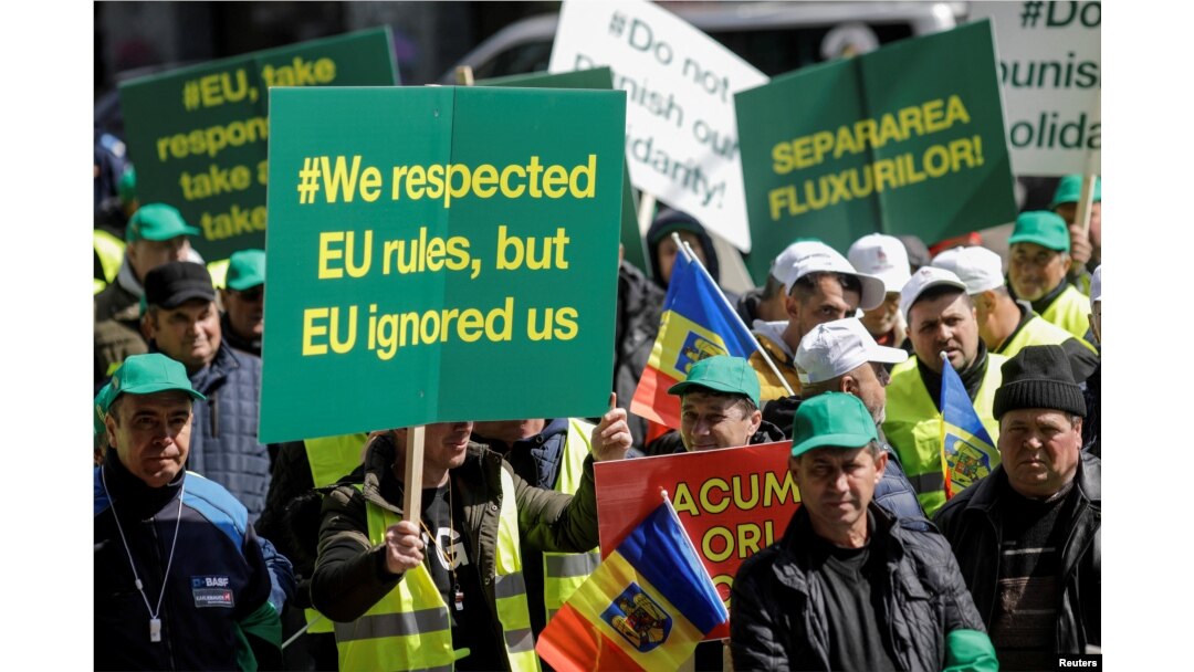 Romanian farmers protest outside the European Commission's Offices over the price of grains, in Bucharest, Romania, April 7, 2023. (Inquam Photos/George Calin via Reuters)