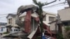 An object blown by strong winds caused by Typhoon Shanshan is stranded on a power line in Miyazaki, southwestern Japan, Aug. 29, 2024, in this photo taken by Kyodo.