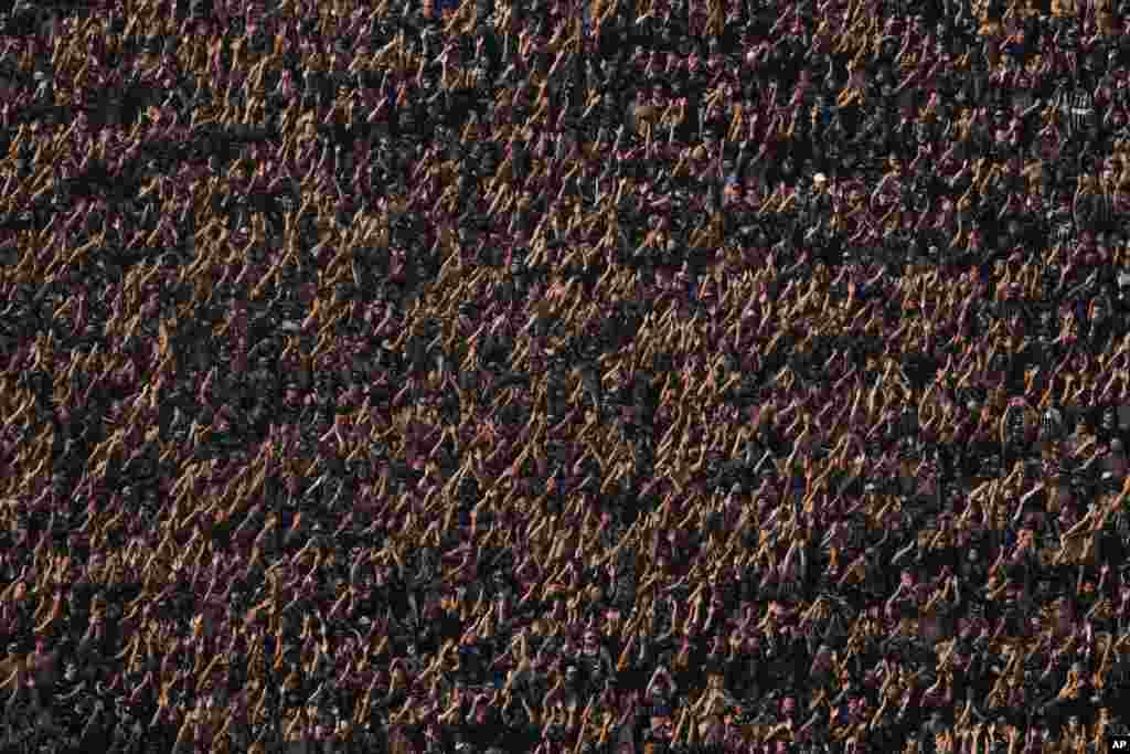 Corinthians fans cheer in the stands of the Neo Quimica arena during a Brazilian soccer league match between Corinthians and Flamengo in Sao Paulo, Brazil, Sept. 1, 2024.