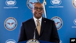 Secretary of Defense Lloyd Austin speaks during a briefing with Chairman of the Joint Chiefs, Gen. Mark Milley at the Pentagon in Washington, March 15, 2023. 