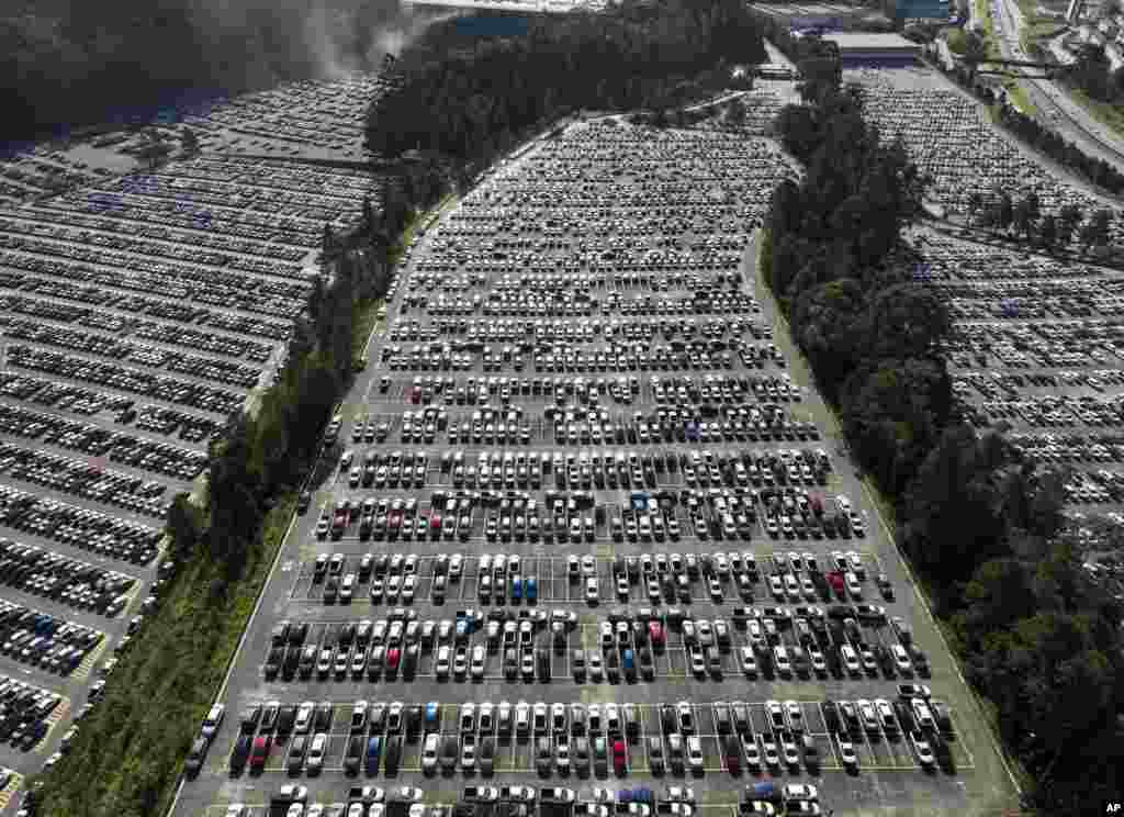 Newly manufactured cars sit parked at the Volkswagen plant in Sao Bernardo do Campo in the greater Sao Paulo area of Brazil, June 28, 2023.&nbsp;The company has temporarily suspended production and scheduled a 10-day collective vacation for its two production shifts starting on July 10 because of they called &quot;market stagnation.&quot;