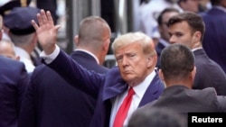 Former President Donald Trump arrives ahead of his arraignment at Manhattan Federal Court in New York, April 4, 2023. 