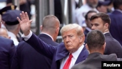FILE - Former President Donald Trump arrives ahead of his arraignment at Manhattan Federal Court in New York, April 4, 2023.