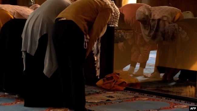 Women gather to pray at Dar Al Hijrah Islamic Center in Falls Church, Va., on Oct. 31, 2023.