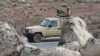 FILE - Soldiers patrol along the border with Syria to prevent trafficking, on Feb. 17, 2022, in this picture taken during a tour organized by the Jordanian Army.