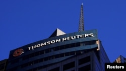 FILE - The Thomson Reuters logo is seen on a building in the Manhattan borough of New York City, Nov. 16, 2021.