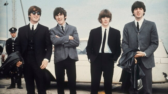 FILE - John Lennon, George Harrison, Ringo Starr and Paul McCartney arrive in Liverpool, England, on July 10, 1964, for the premiere of