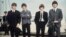 FILE - John Lennon, George Harrison, Ringo Starr and Paul McCartney arrive in Liverpool, England, on July 10, 1964, for the premiere of "A Hard Day's Night." 