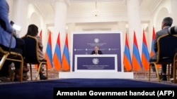 Armenian Prime Minister Nikol Pashinyan holds a press conference in Yerevan on March 14, 2023.