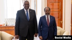 U.S. Secretary of Defense Lloyd Austin, left, and Somali President Hassan Sheikh Mohamud pose for a photo during their meeting in Djibouti City, Sept. 24, 2023. (@SecDef)