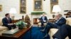 President Joe Biden speaks during a meeting with Congressional leaders in the Oval Office of the White House, in Washington, Feb. 27, 2024. From left, House Speaker Mike Johnson, Vice President Kamala Harris, Biden and Senate Majority Leader Chuck Schumer.