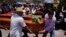 Pallbearers carry the casket of armed civilian defense leader Hipolito Mora during a funeral service for him and two of his bodyguards, in La Ruana, Mexico, July 1, 2023. 
