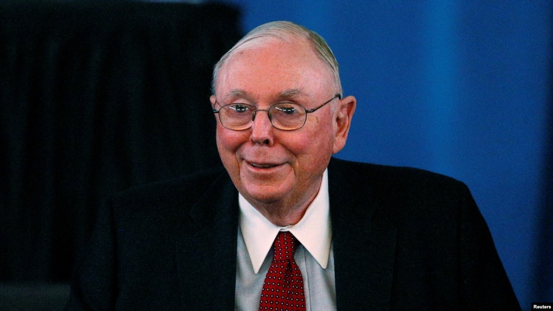 FILE — Berkshire Hathaway Vice Chair Charlie Munger arrives to begin the company's annual meeting in Omaha May 4, 2013. Munger died Nov. 28, 2023, at age 99. 