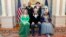 Clockwise from left, 2023 Kennedy Center Honorees Queen Latifah, Barry Gibb, Renee Fleming, Billy Crystal and Dionne Warwick pose for a photo at the State Department following the Kennedy Center Honors gala dinner, Dec. 2, 2023, in Washington.