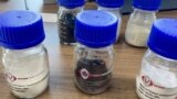 FILE - Rare earth oxide samples are seen at mining company VTRE in Hanoi, Vietnam, Sept. 7, 2023. 