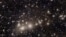Galaxies belonging to the Perseus Cluster and others farther away are captured by the Euclid telescope, which was designed to explore the dark matter and dark energy that are thought to make up 95% of the universe. (European Space Agency via Reuters)