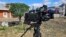 The damaged camera of Pan-Arab TV network Al-Mayadeen cameraman Rabih Maamari, who was killed in an Israeli strike, is seen at the Lebanese border village of Tair Harfa near the border with Israel, Nov. 21, 2023.