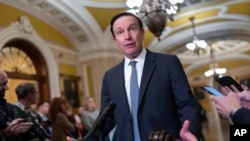 FILE - Sen. Chris Murphy, the Democrats' chief negotiator in border security talks, speaks to reporters in Washington, Dec. 19, 2023. The Senate on Feb. 7, 2024, failed to advance a bill to tighten migration controls at the U.S.-Mexico border.