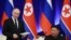 Presiden Rusia Vladimir Putin dan Pemimpin Korea Utara Kim Jong Un menghadiri acara bersama di Pyongyang, Korea Utara, pada 19 Juni 2024. (Foto: Sputnik/Vladimir Smirnov/Pool via Reuters)