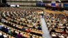 Members of European Parliament participate in a series of votes as they attend a plenary session at the European Parliament in Brussels, April 10, 2024.