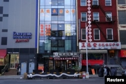 FILE - The former office of the America ChangLe Association, described by U.S. authorities as a Chinese "secret police station," is seen on the fourth floor of the Royal East Plaza building in the Chinatown neighborhood of New York City, April 17, 2023. (REUTERS/Bing Guan)