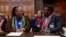 Menlu Afrika Selatan Naledi Pandor (kiri) dan Duta Besar Afrika Selatan untuk Belanda Vusimuzi Madonsela berbicara di Mahkamah Internasional PBB (ICJ) di Den Haag, Belanda. 