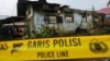 Garis polisi dipasang di sebuah rumah yang terbakar (foto: ilustrasi). Banyak warga menilai polisi baru mengambil tindakan serius ketika suatu masalah menjadi viral di medsos. 