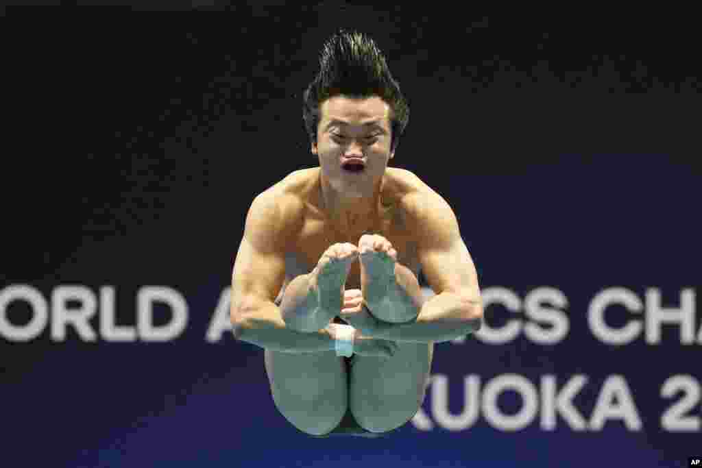 Woo Haram of South Korea competes during the men&#39;s 1m springboard diving competition at the World Swimming Championships in Fukuoka, Japan.