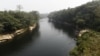 FILE - The Cross River, shown here on Feb. 1, 2018, serves as the border between Nigeria and Cameroon near Mfum, Nigeria. On June 27, 2024, the nations announced a plan to settle disputes over several border locations by the end of 2025.