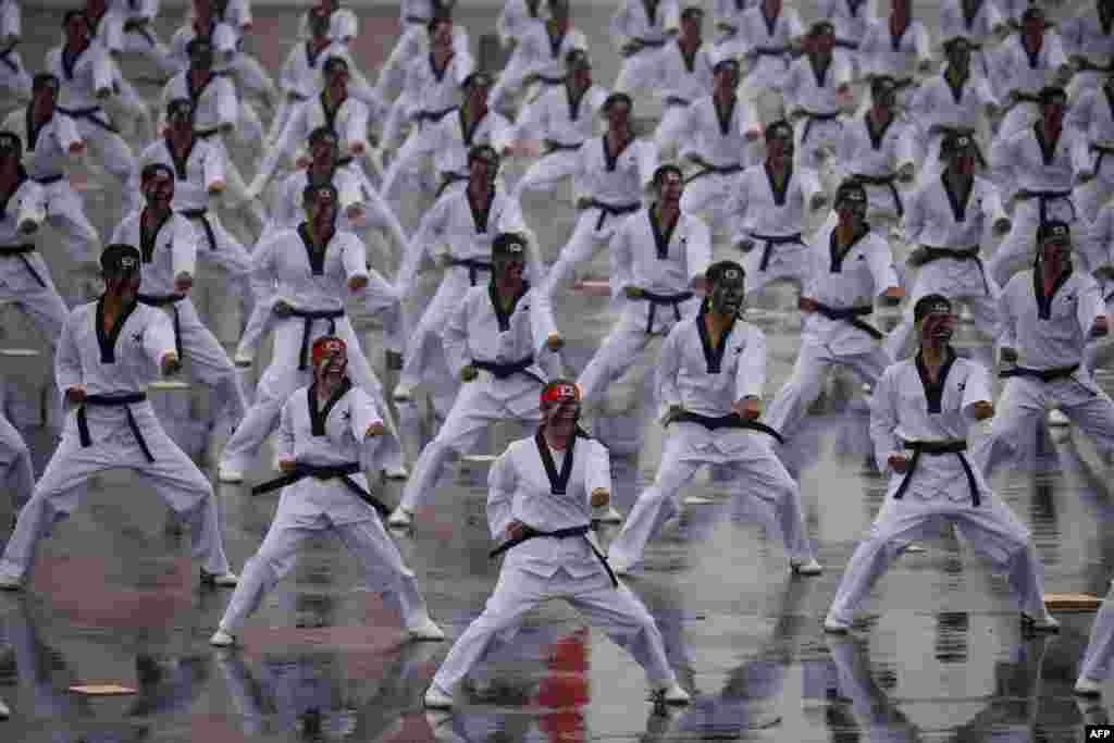 South Korean soldiers demonstrate their taekwondo skills during a ceremony to mark the 75th anniversary of Korea Armed Forces Day in Seongnam.
