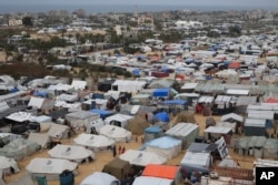 FILE— A tent camp housing Palestinians displaced by the Israeli offensive is seen in Rafah, Gaza Strip, February 27, 2024.