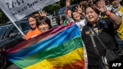 FLE - People attend the Tokyo Rainbow Pride 2023 Parade in Tokyo, Japan, April 23, 2023, to show support for members of the country's LGBTQ+ community.