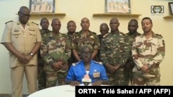 Porta-voz do Exército do Níger, coronel Major Amadou Adramane, falando pelo Comité Nacional de Salvação Popular, em Niamey, 26 Julho 2023