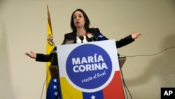 (FILE) Opposition leader Maria Corina Machado gives a press conference regarding her 15-year ban from running for public office in Venezuela.