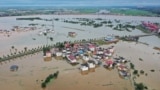 The aerial photo taken on July 2, 2024 shows submerged buildings after a flood peak in Jiujiang, in central China's Jiangxi province. 