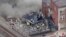 In this screen grab from video provided by WPVI-TV/6ABC, smoke rises from an explosion at the R.M. Palmer Co. plant in West Reading, Pa., March 24, 2023. (WPVI-TV/6ABC via AP)