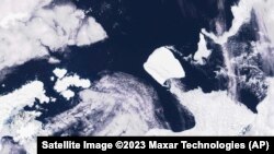 This images provided by Maxar Technologies shows the A23a iceberg moving through the sea near the Antarctica, Nov. 15, 2023. 