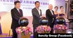 Suncity Group CEO Alvin Chau and alleged Taiwan triad member Lin Pin-Wen, second and third from left, attend the launch event of a gambling venture in Manila, Philippines, in 2018. (Facebook page of the Suncity Group)
