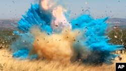 FILE - A gender reveal event that ignited a 47,000-acre wildfire is seen in the Santa Rita Mountain foothills in Arizona, April 23, 2017. A similar event started a wildfire at El Dorado Ranch Park, California, Sept. 5, 2020. (U.S. Forest Service via AP)