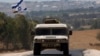 Фото: Військова машина маневрує біля кордону Ізраїлю та Смугою Гази під час конфлікту між Ізраїлем і ХАМАСом, 20 червня 2024 року.