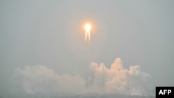 FILE - A rocket lifts off from Wenchang Space Launch Center in southern China's Hainan province, May 3, 2024. Beijing Tianbing Technology Company said Sunday that the first stage of its Tianlong-3 rocket under development had detached from its launch pad during a test.