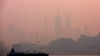 The Empire State Building in midtown Manhattan in New York City is pictured shortly after sunrise as haze and smoke caused by wildfires in Canada hangs over the Manhattan skyline in as seen from Jersey City, New Jersey, June 8, 2023. 