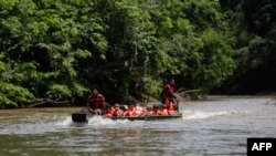 Fotografía de migrantes a su llegada a la Estación de Recepción de Migrantes en Lajas Blancas, provincia de Darién, Panamá, el 6 de octubre de 2023.