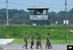 South Korean army soldiers pass by a military guard post at the Imjingak Pavilion in Paju, South Korea, near the border with North Korea, Wednesday, July 19, 2023. (AP Photo/Ahn Young-joon)