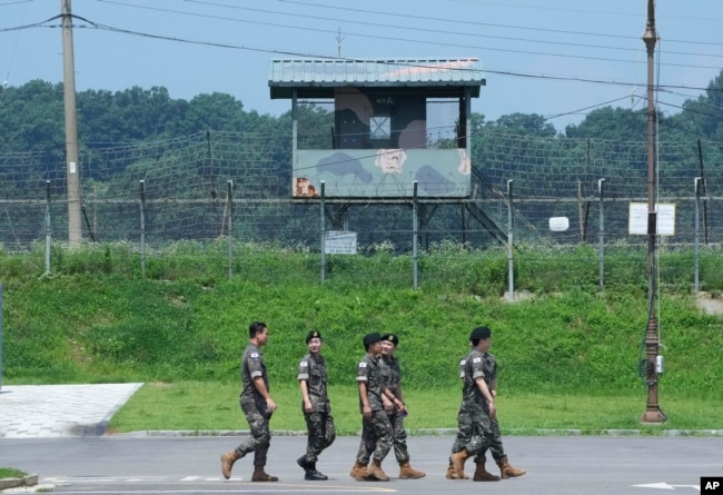 South Korean army soldiers pass by a military guard post at the Imjingak Pavilion in Paju, South Korea, near the border with North Korea, Wednesday, July 19, 2023. (AP Photo/Ahn Young-joon)